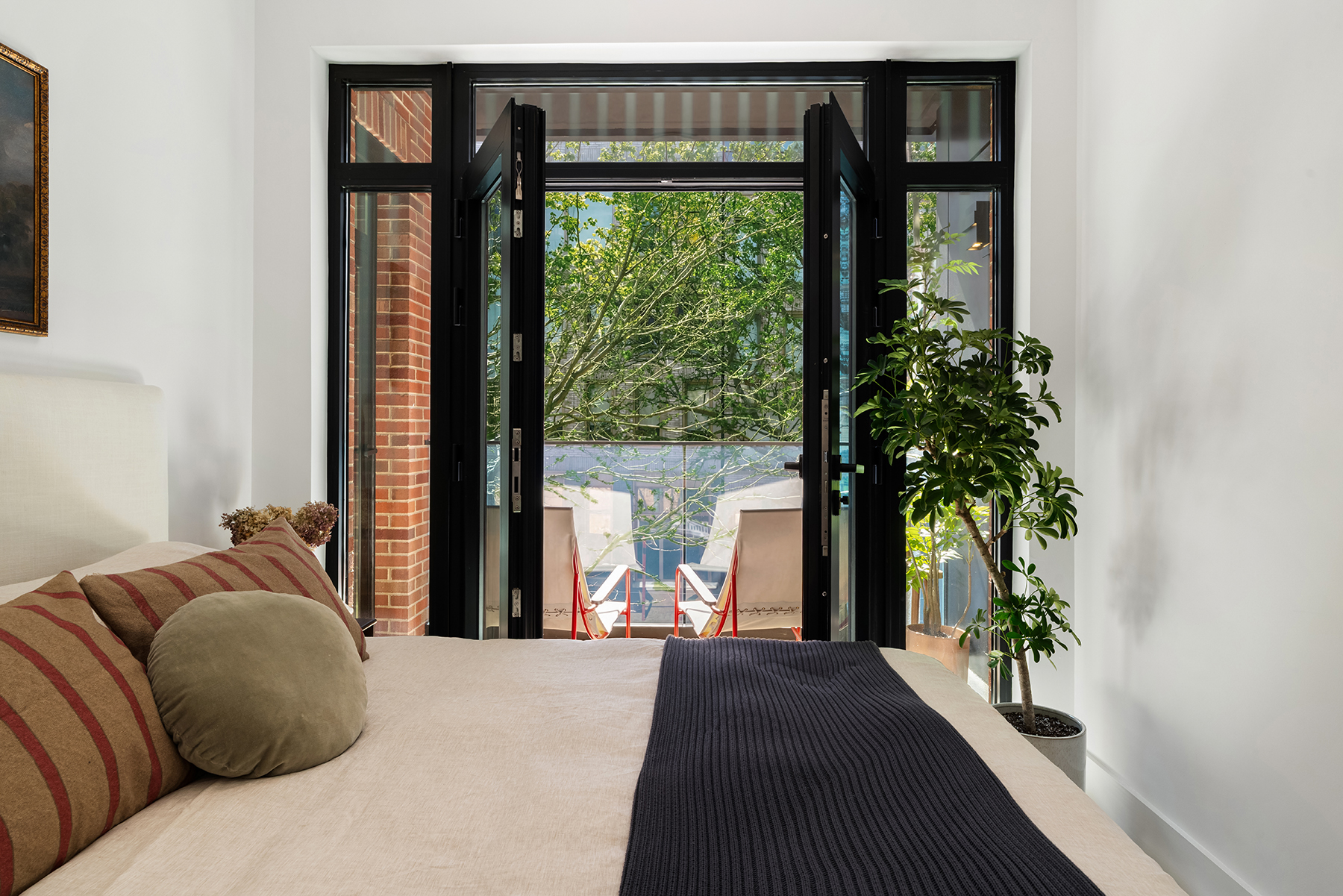 Second bedroom with access to private balcony
